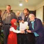 الفنانة أميرة عصام الدين زكريا في معرض Artopia International Art Exhibition: تجسيد تراثي لشخصية بائع العرقسوس